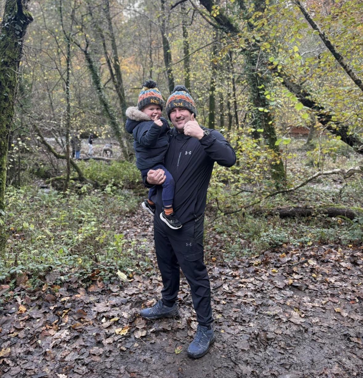 Nathan Mayhew and his son on a woodland hike
